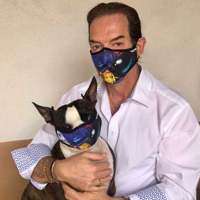 Remy and dog Zuzu wearing new masks